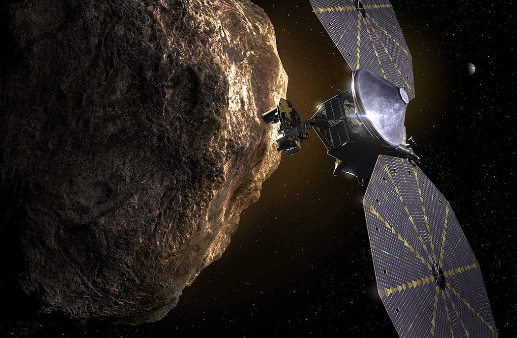 Künstlerisches Darstellung der Raumsonde Lucy, die einen trojanischen Asteroiden passiert | Quelle: NASA